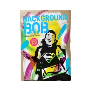 Book cover with text at the top 'Background Bob and his amazing friends – guess who’s back' and colourful artwork depicting Noah aka Background Bob.