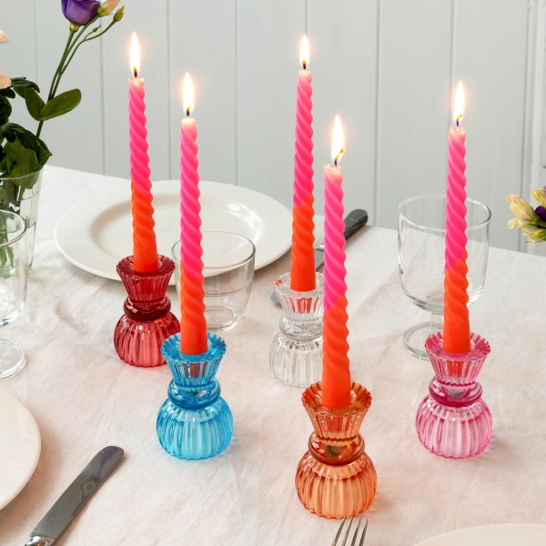Double ended glass candles with red candles in