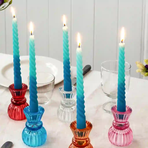 Five Dip dye candles in multi-coloured holders