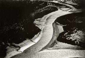 black and white aerial photograph of salt marsh in Essex