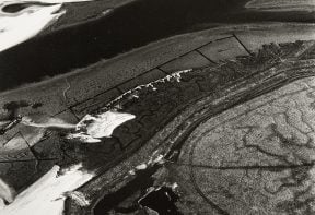 black and white aerial photograph of salt marsh in Essex