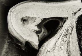 black and white aerial photograph of salt marsh in Essex