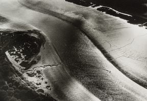 black and white aerial photograph of salt marsh in Essex