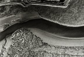 black and white aerial photograph of salt marsh in Essex