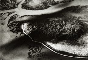 black and white aerial photograph of salt marsh in Essex