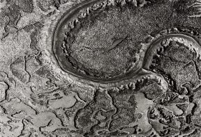 black and white aerial photograph of salt marsh in Essex