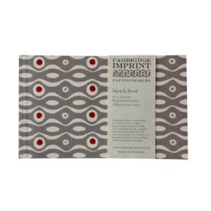Front of the Cambridge imprint sketch book with the label included, in Persephone Grey and Crimson