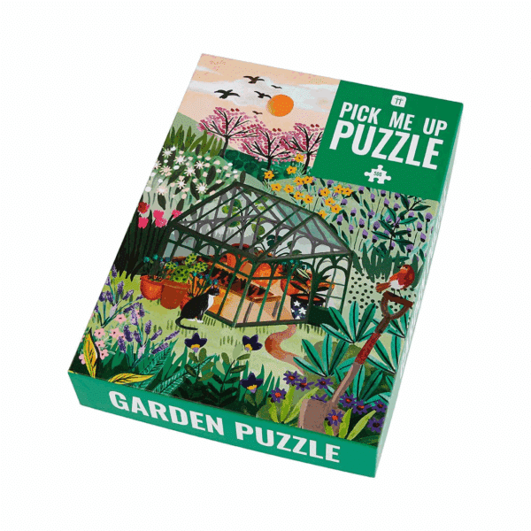 A colorful garden-themed puzzle box featuring various flowers and plants with the text 'Pick Me Up Puzzle' in the top right corner on a green background.